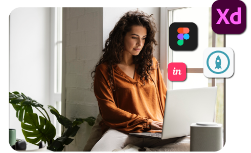 a woman browsing on her computer with apps like Figma
